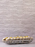 صورة صحن بيضاوي من الصدف الابيض و 800 غرام من الكاكاو البلجيكي
