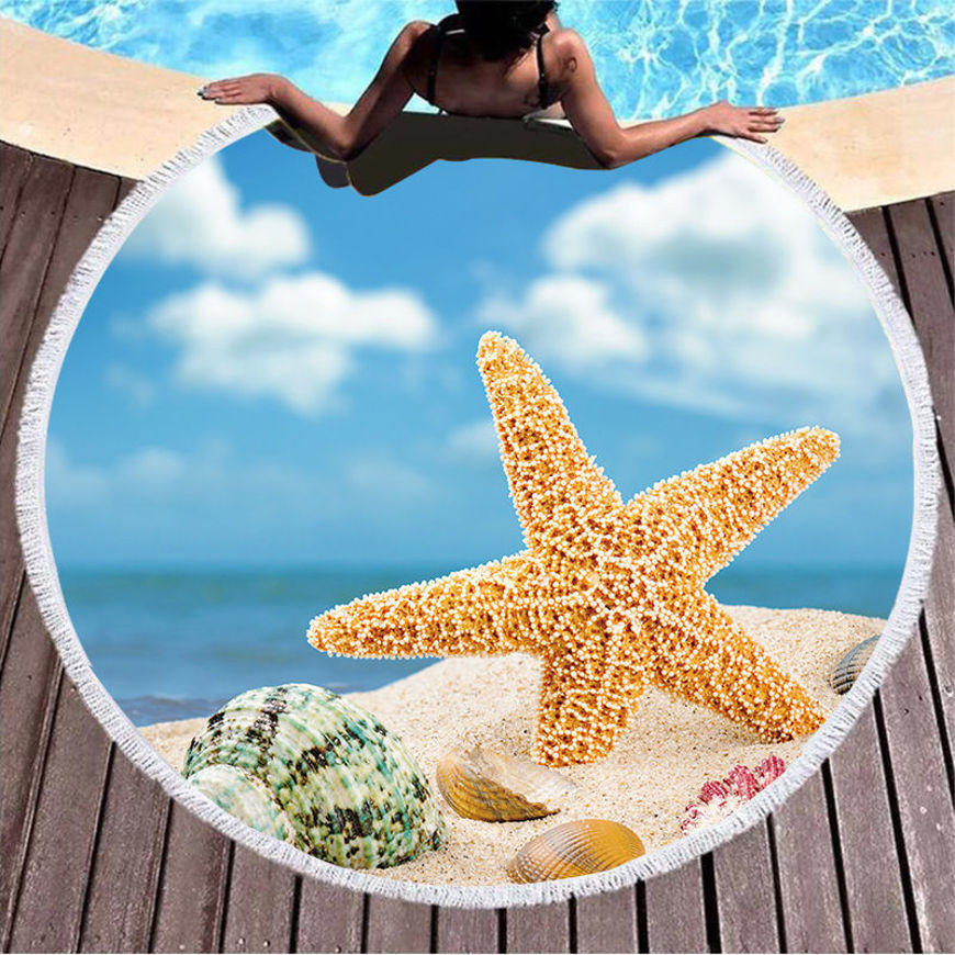 صورة فوطة دائرية للشاطئ ملونه مع رسمة نجمة البحر