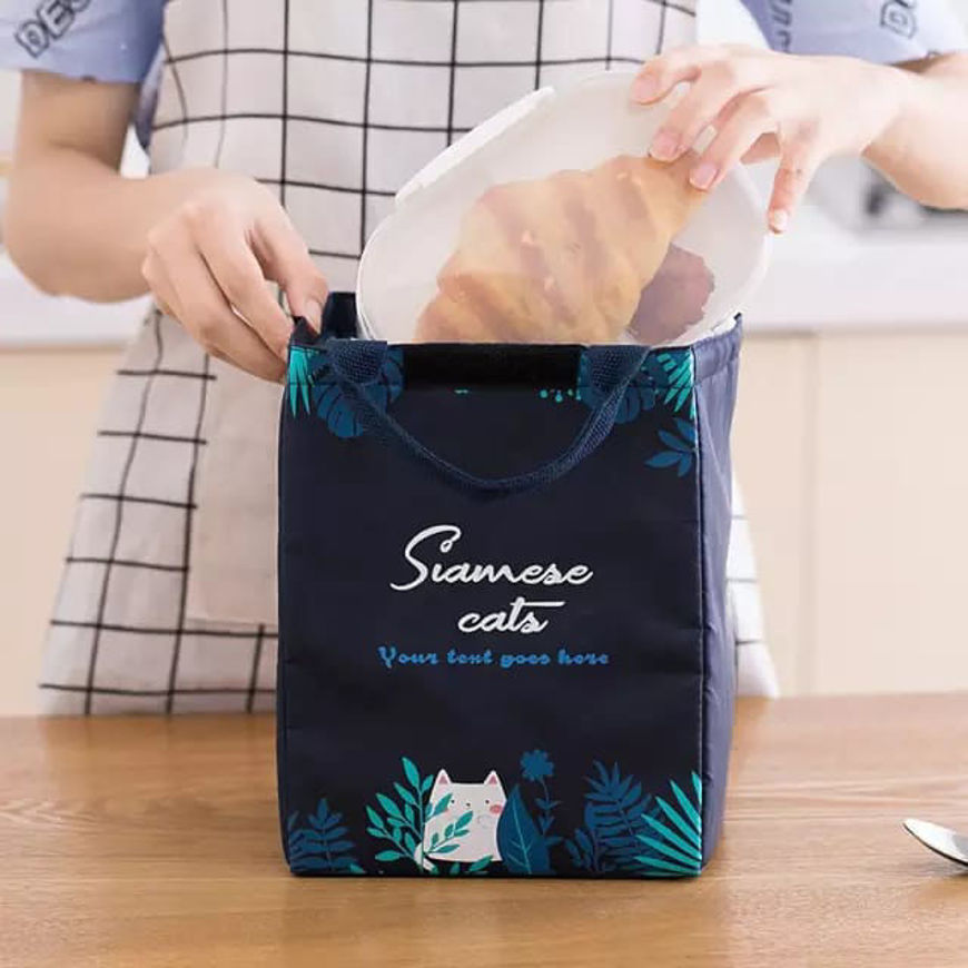 صورة حقيبة طعام لون ازرق مع رسمة اوراق الشجر